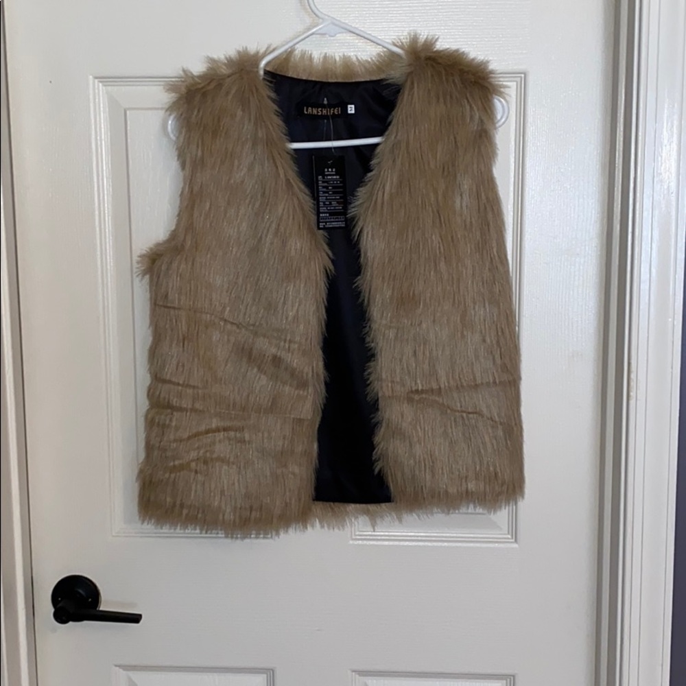 Fur vest (tag attached)